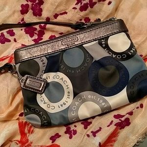 Blue and grey Coach wristlet
